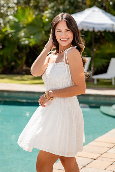 shopdressup_white_eyelet_mini_dress-5_b0063387-881a-4222-9612-545fd461b870_600x600.jpg